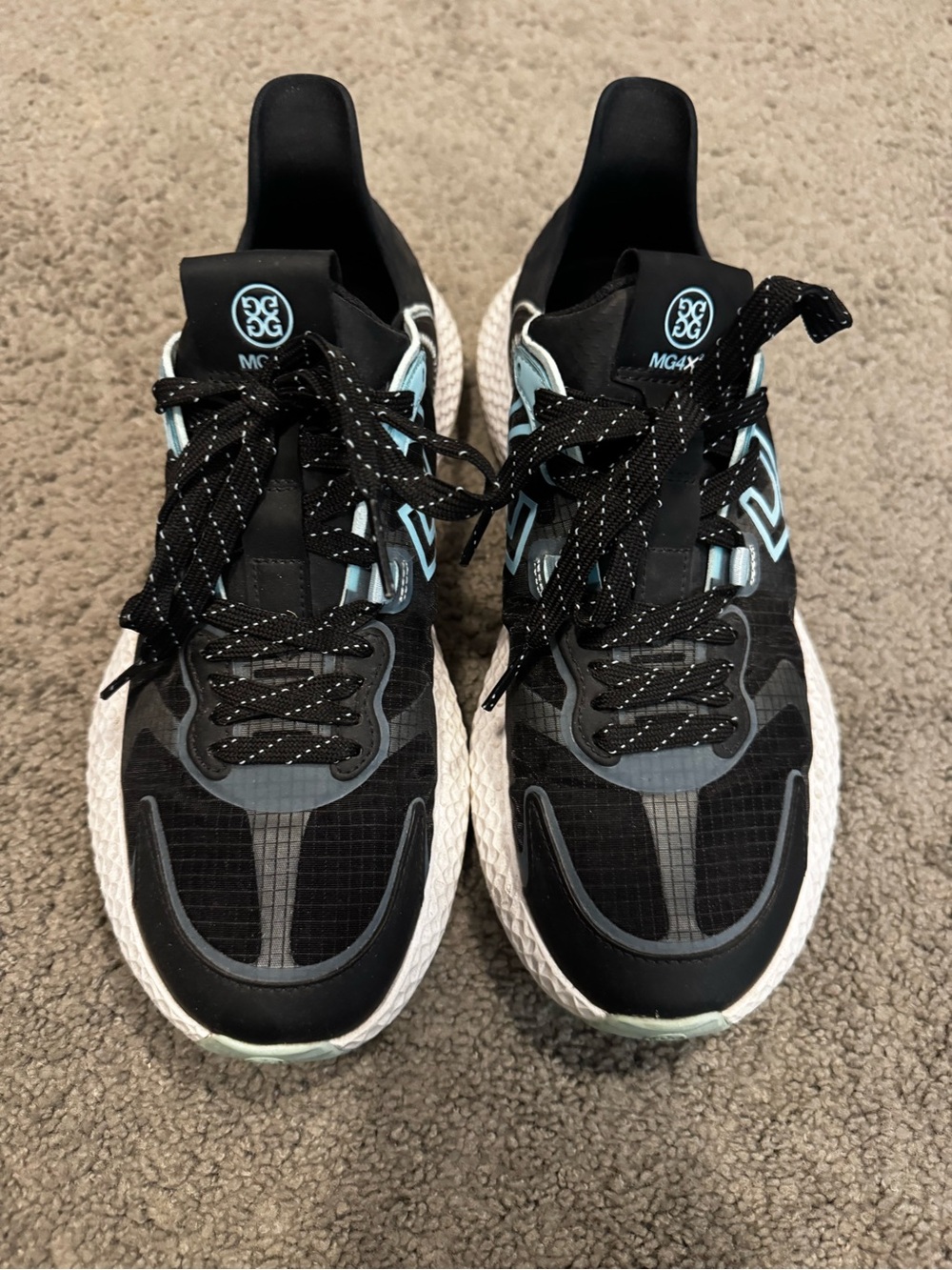G/FORE Women's Black and White Athletic Sneakers with Light Blue Accents